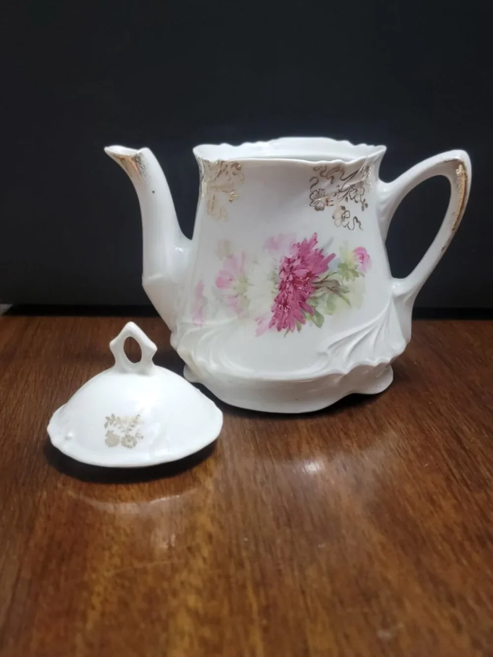 Vintage floral porcelain teapot with lid